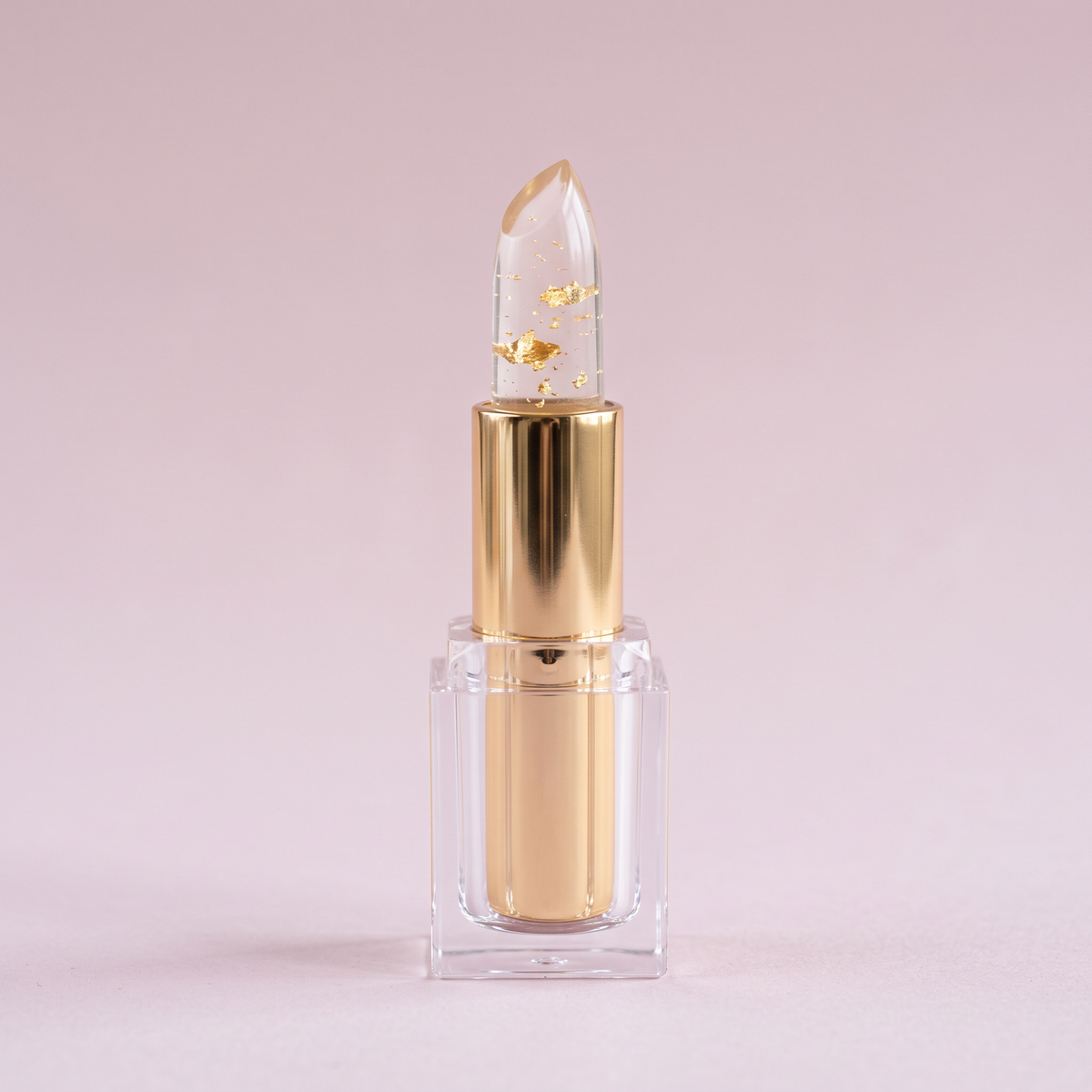 Aura pH Lipstick twisted up showing the clear gold flecked bullet